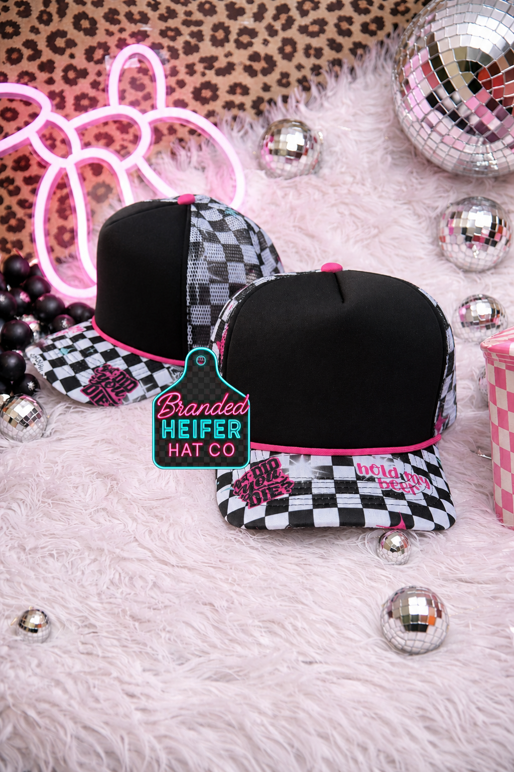 BLACK FERAL CHECKERED HIDE-A-PONY FOAM TRUCKER HAT