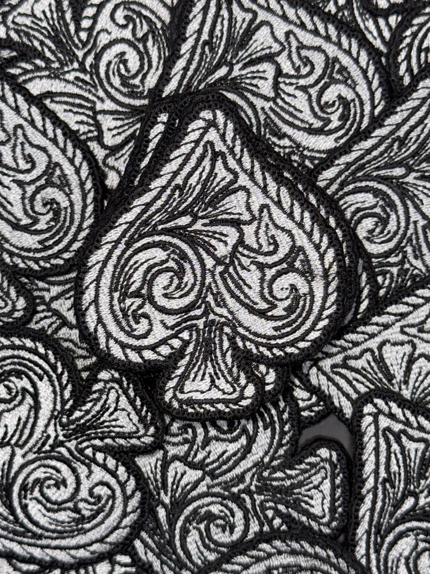 Tooled spade embroidery patch