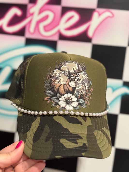 Floral deer and pearl trucker that