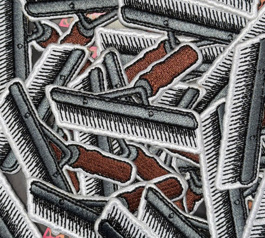 Cattle comb embroidery patch
