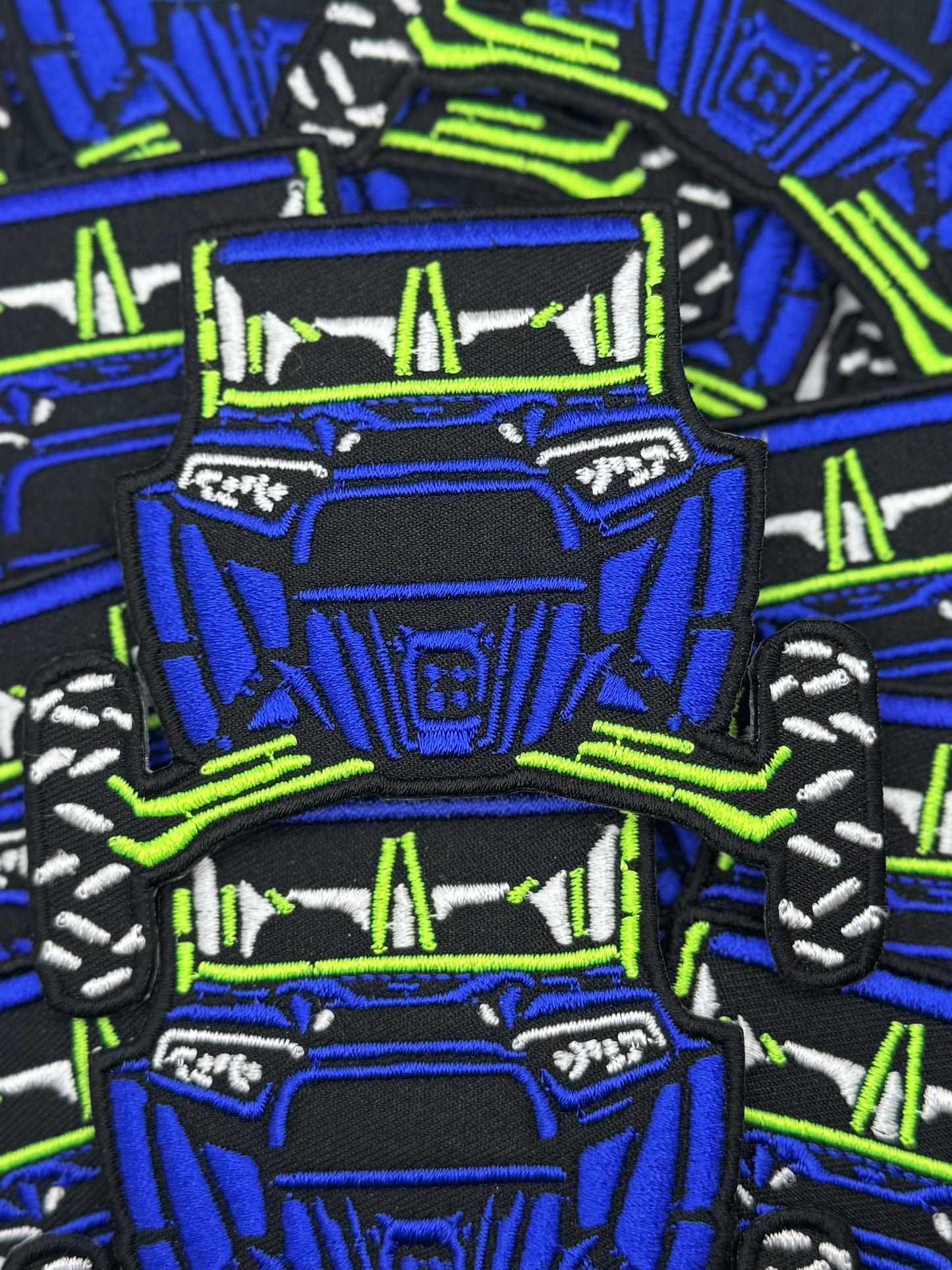 Electric blue and neon green SxS embroidery patch