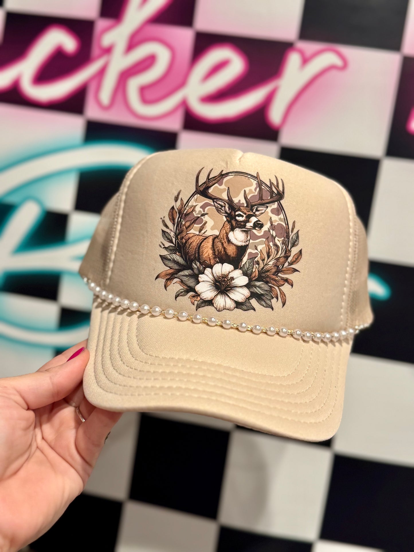 Floral deer and pearl trucker that