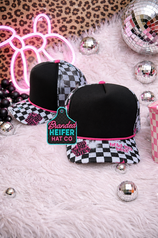 BLACK FERAL CHECKERED HIDE-A-PONY FOAM TRUCKER HAT