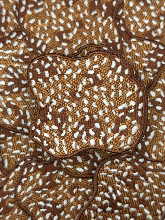 Axis hide embroidery patch