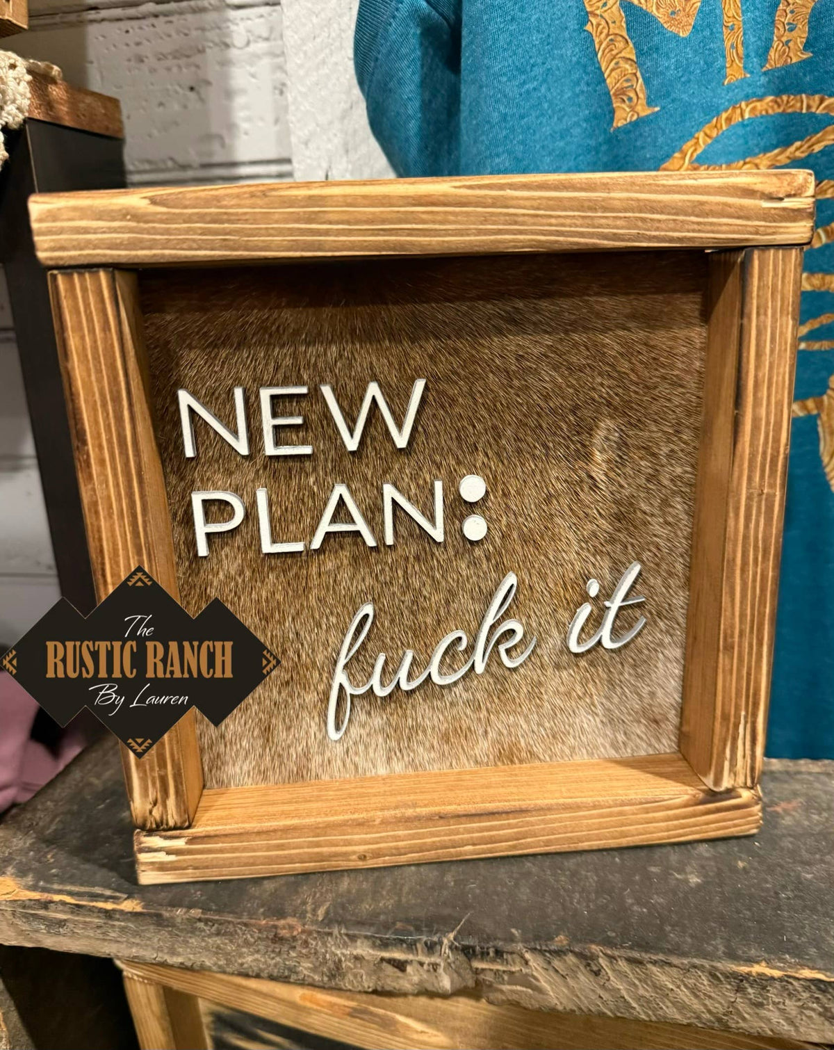 New Plan Framed Cowhide Sign 